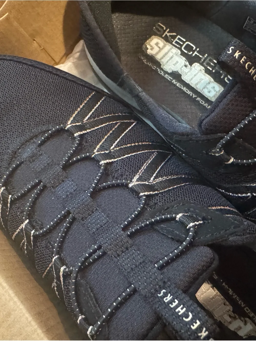 Skechers slip hands